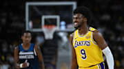 Oct 4, 2024; Palm Desert, California, USA; Los Angeles Lakers guard Bronny James (9) reacts against the Minnesota Timberwolves during the second half at Acrisure Arena. Mandatory Credit: Jonathan Hui-Imagn Images