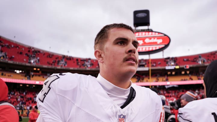 Dec 25, 2023; Kansas City, Missouri, USA; Las Vegas Raiders quarterback Aidan O'Connell (4) on field against the Kansas City Chiefs after the game at GEHA Field at Arrowhead Stadium. Mandatory Credit: Denny Medley-USA TODAY Sports