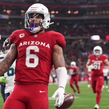 Jan 7, 2024; Glendale, Arizona, USA; Arizona Cardinals running back James Conner (6) celebrates a touchdown against the Seattle Seahawks during the second half at State Farm Stadium. Mandatory Credit: Joe Camporeale-USA TODAY Sports