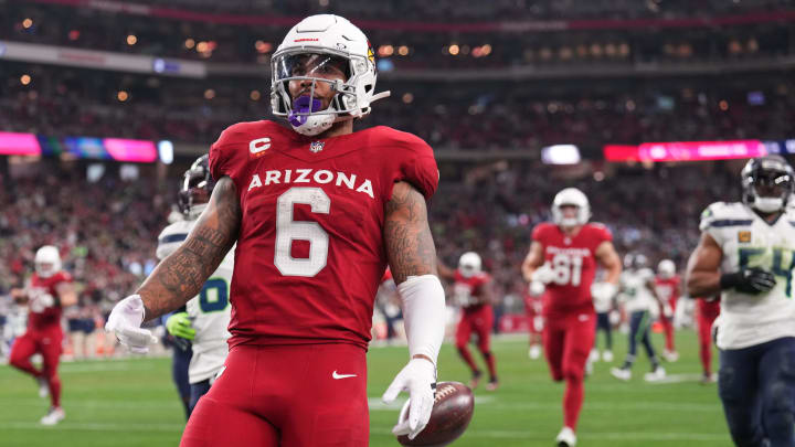 Jan 7, 2024; Glendale, Arizona, USA; Arizona Cardinals running back James Conner (6) celebrates a touchdown against the Seattle Seahawks during the second half at State Farm Stadium. Mandatory Credit: Joe Camporeale-USA TODAY Sports