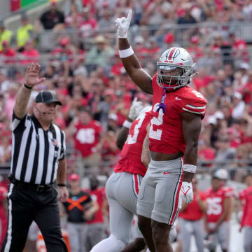 August 31, 2024; Columbus, Ohio, USA;
Ohio State Buckeyes safety Caleb Downs (2) celebrates after sacking Akron Zips quarterback Ben Finley (10) during the first half of Saturday’s NCAA Division I football game at Ohio Stadium.