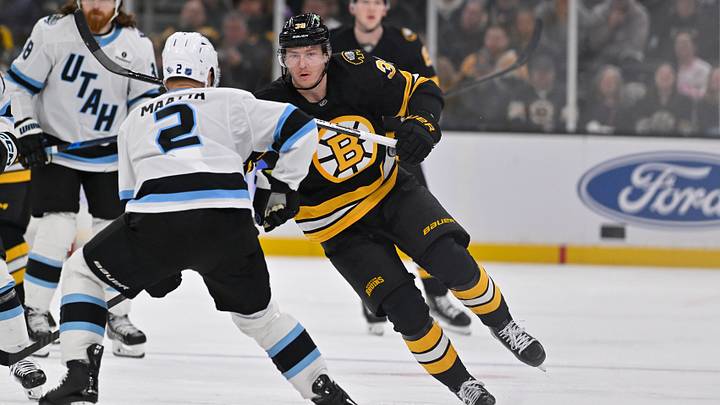 Dec 16, 2025; Boston, Massachusetts, USA; Boston Bruins center Morgan Geekie (39) watches the puck as he skates against Utah Mammoth defenseman Olli Maatta (2) during the third period at TD Garden. Mandatory Credit: Eric Canha-Imagn Images Dec 16, 2025; Boston, Massachusetts, USA; Boston Bruins center Morgan Geekie (39) watches the puck as he skates against Utah Mammoth defenseman Olli Maatta (2) during the third period at TD Garden. Mandatory Credit: Eric Canha-Imagn Images