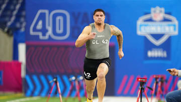 Feb 29, 2024; Indianapolis, IN, USA; UCLA defensive lineman Laiatu Latu (DL42) works out during the