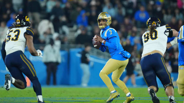 UCLA Bruins quarterback Dante Moore throws the ball against the California Golden Bears in the first half at Rose Bowl.