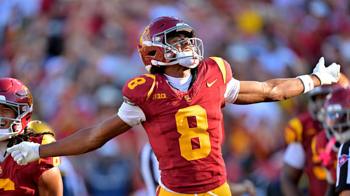 Oct 11, 2025; Los Angeles, California, USA;  USC Trojans wide receiver Ja'Kobi Lane (8) celebrates after a touchdown in the first half against the Michigan Wolverines at United Airlines Field at the Los Angeles Memorial Coliseum. Mandatory Credit: Jayne Kamin-Oncea-Imagn Images