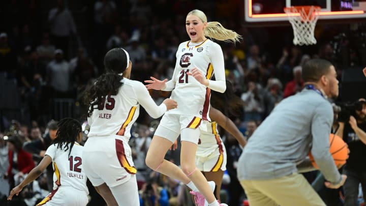 South Carolina basketball forward Chloe Kitts celebrating with Sakima Walker after winning the National Championship