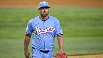 Sep 22, 2024; Arlington, Texas, USA; Texas Rangers relief pitcher Kirby Yates (39) walks off the field after he pitches against the Seattle Mariners during the ninth inning at Globe Life Field. Mandatory Credit: Jerome Miron-Imagn Images