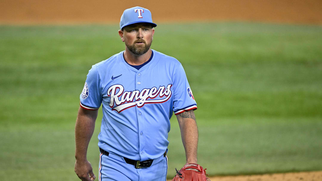 Sep 22, 2024; Arlington, Texas, USA; Texas Rangers relief pitcher Kirby Yates (39) walks off the field after he pitches against the Seattle Mariners during the ninth inning at Globe Life Field.
