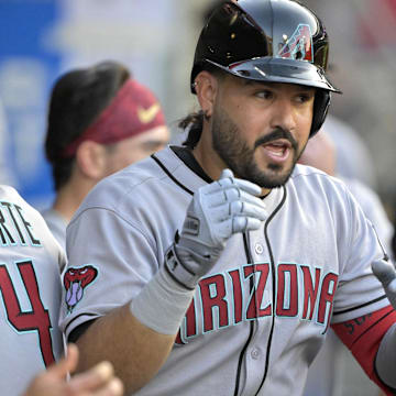 Arizona Diamondbacks third baseman Eugenio Suarez (28) celebrates with  second baseman Ketel Marte (4) after his second solo home run of the game during the fourth inning against the Los Angeles Angels at Angel Stadium on July 12. 