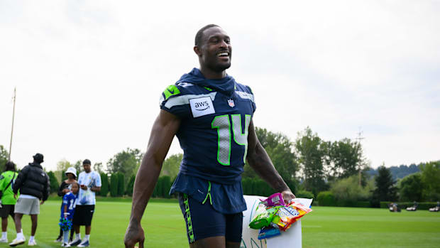 Seattle Seahawks wide receiver DK Metcalf (14) walks off the field after training camp