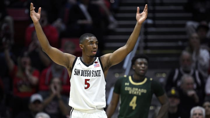 Feb 13, 2024; San Diego, California, USA; San Diego State Aztecs guard Lamont Butler (5) gestures during the second half against the Colorado State Rams at Viejas Arena. Mandatory Credit: Orlando Ramirez-USA TODAY Sports