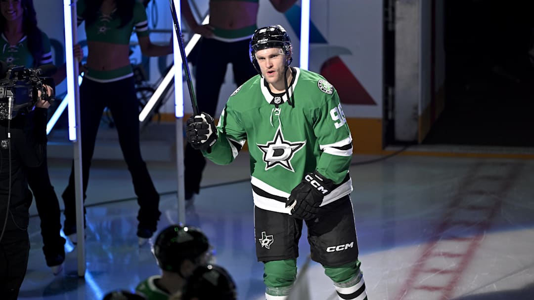 Feb 4, 2026; Dallas, Texas, USA; Dallas Stars right wing Mikko Rantanen (96) takes the ice as the Stars celebrate their 2026 Winter Olympics hockey players before the game against the St. Louis Blues at the American Airlines Center. Mandatory Credit: Jerome Miron-Imagn Images