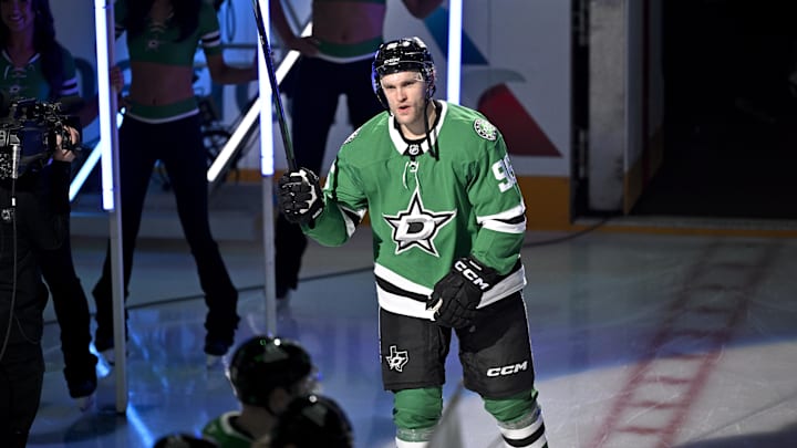 Feb 4, 2026; Dallas, Texas, USA; Dallas Stars right wing Mikko Rantanen (96) takes the ice as the Stars celebrate their 2026 Winter Olympics hockey players before the game against the St. Louis Blues at the American Airlines Center. Mandatory Credit: Jerome Miron-Imagn Images