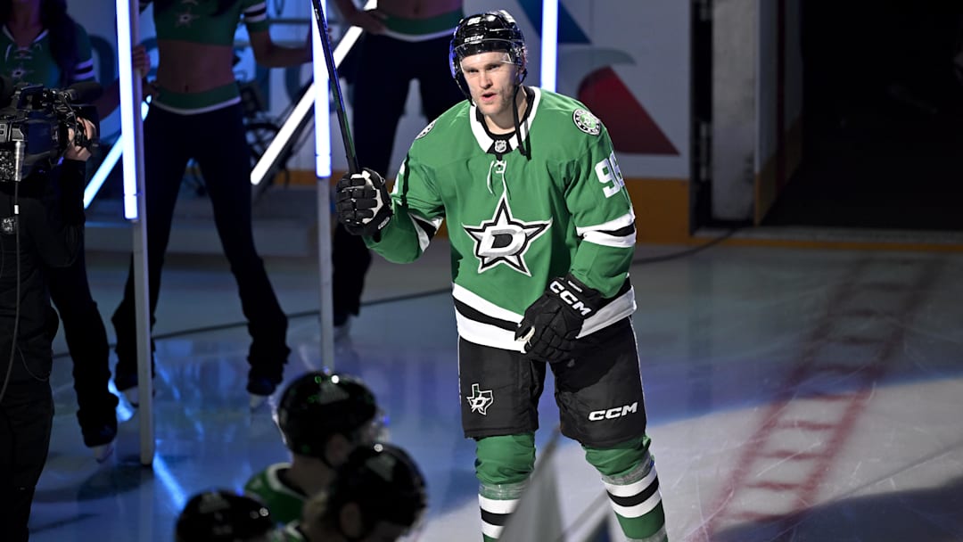 Feb 4, 2026; Dallas, Texas, USA; Dallas Stars right wing Mikko Rantanen (96) takes the ice as the Stars celebrate their 2026 Winter Olympics hockey players before the game against the St. Louis Blues at the American Airlines Center. Mandatory Credit: Jerome Miron-Imagn Images