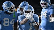 Nov 22, 2025; Chapel Hill, North Carolina, USA; North Carolina Tar Heels wide receiver Jordan Shipp (1) celebrates after a touchdown during the second half at Kenan Stadium. Mandatory Credit: William Howard-Imagn Images