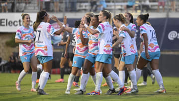 Jul 20, 2024; San Diego, CA, USA; San Diego Wave FC defender Kennedy Wesley (12) celebrates with teammates after scoring a goal against Bay FC in the first half at Torero Stadium. Mandatory Credit: Denis Poroy-USA TODAY Sports