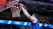 Nov 18, 2022; Dallas, Texas, USA; Dallas Mavericks center JaVale McGee (00) dunks the ball against the Denver Nuggets during the second quarter at the American Airlines Center. Mandatory Credit: Jerome Miron-Imagn Images