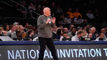 Mar 29, 2022; New York, New York, USA; St. Bonaventure Bonnies head coach Mark Schmidt reacts to a play on the court against the Xavier Musketeers during the NIT college basketball semifinals at Madison Square Garden. Mandatory Credit: Gregory Fisher-Imagn Images