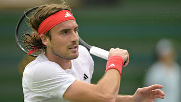 Stefanos Tsitsipas hits a shot