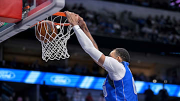 Nov 18, 2022; Dallas, Texas, USA; Dallas Mavericks center JaVale McGee (00) dunks the ball against the Denver Nuggets during the second quarter at the American Airlines Center. Mandatory Credit: Jerome Miron-Imagn Images