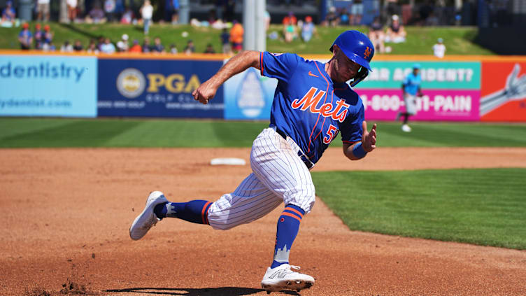 Feb 27, 2024; Port St. Lucie, Florida, USA;  New York Mets second baseman Rylan Bannon (58) rounds third base and scores a run in the third inning against the Miami Marlins at Clover Park. Mandatory Credit: Jim Rassol-USA TODAY Sports