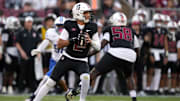 Oct 19, 2024; Stanford, California, USA; Stanford Cardinal quarterback Elijah Brown (2) drops back to pass against the Southern Methodist Mustangs during the second quarter at Stanford Stadium. Mandatory Credit: Darren Yamashita-Imagn Images
