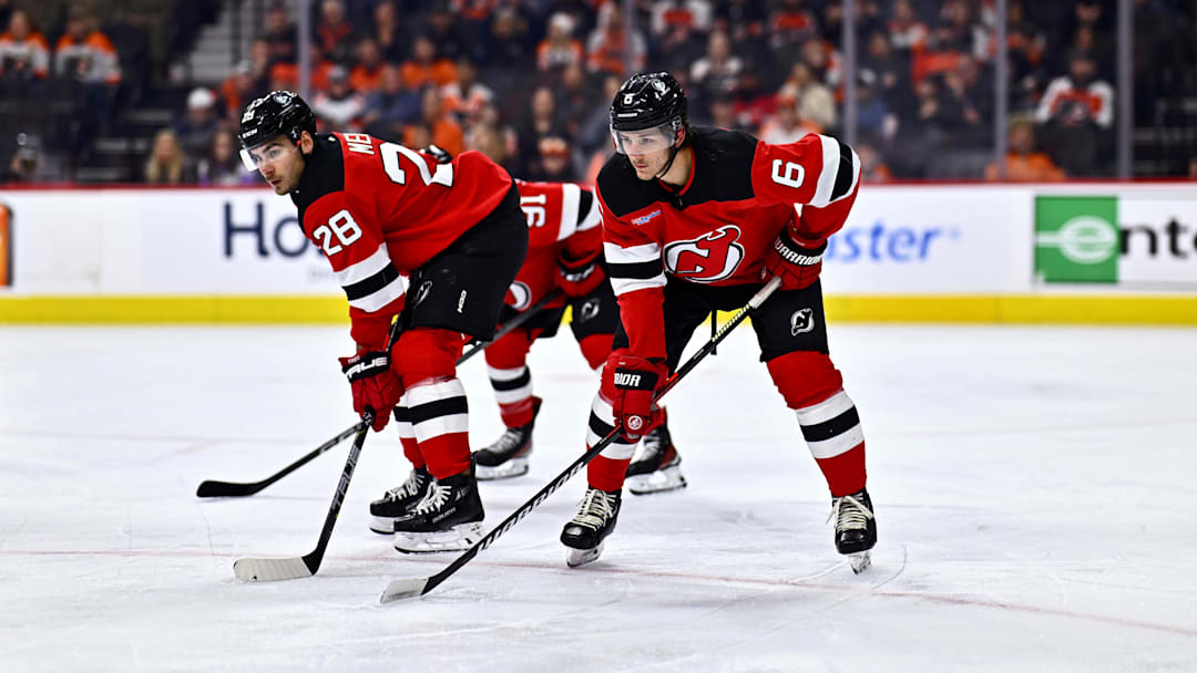 Apr 13, 2024; Philadelphia, Pennsylvania, USA; New Jersey Devils defenseman John Marino (6) readies for a faceoff against the Philadelphia Flyers in the first period at Wells Fargo Center. Mandatory Credit: Kyle Ross-Imagn Images