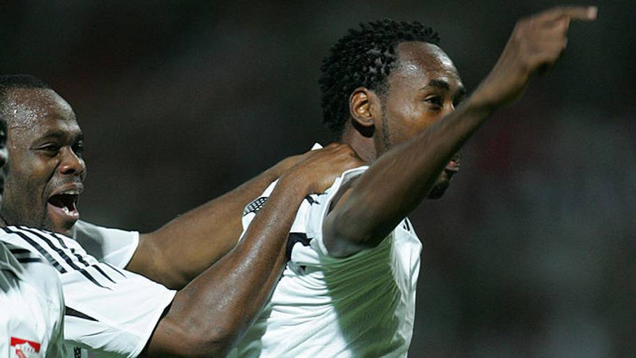 Dennis Lawrence celebrates his famous goal against Bahrain.