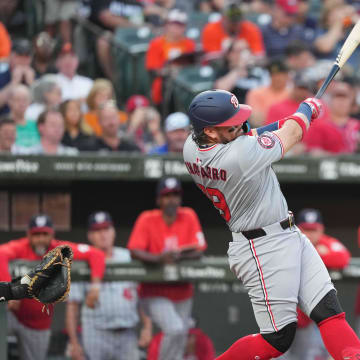 Aug 13, 2024; Baltimore, Maryland, USA; Washington Nationals first baseman Andres Chaparro (19) doubles in the fourth inning for his first major league hit against the Baltimore Orioles at Oriole Park at Camden Yards.