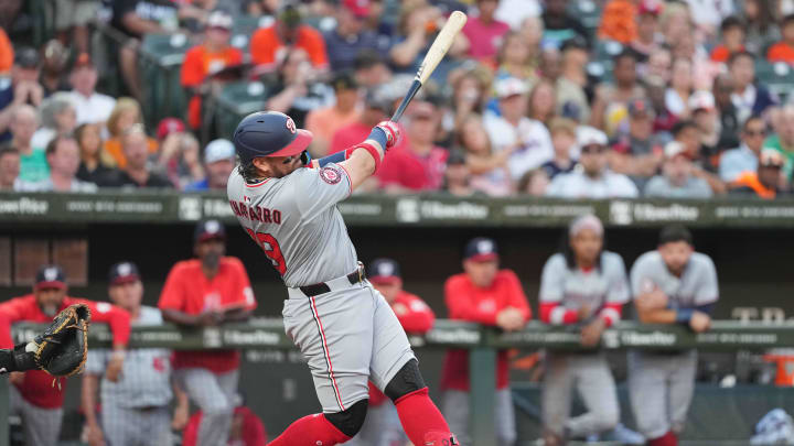 Aug 13, 2024; Baltimore, Maryland, USA; Washington Nationals first baseman Andres Chaparro (19) doubles in the fourth inning for his first major league hit against the Baltimore Orioles at Oriole Park at Camden Yards.