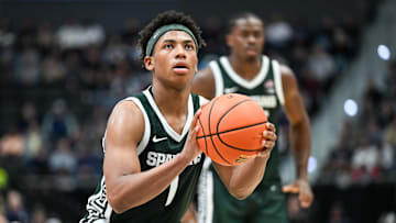 Michigan State is a home favorite against Arkansas in Saturday's college basketball slate.