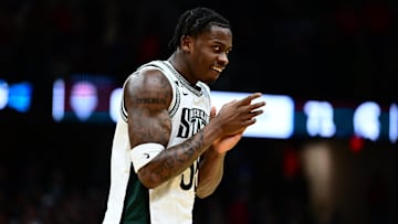 Mar 23, 2025; Cleveland, OH, USA; Michigan State Spartans forward Coen Carr (55) reacts after defeating the New Mexico Lobos during the NCAA Tournament Second Round at Rocket Arena. Mandatory Credit: Ken Blaze-Imagn Images