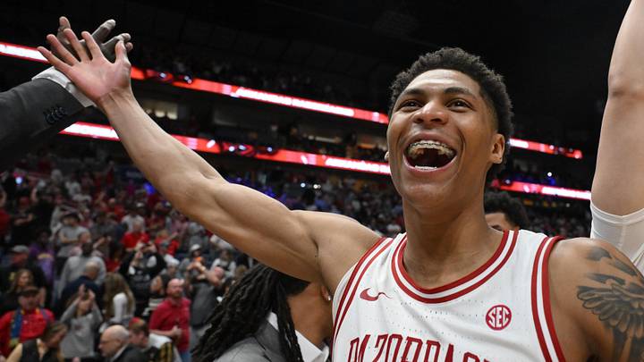 Mar 15, 2026; Nashville, TN, USA; Arkansas Razorbacks guard Meleek Thomas (1) celebrates after the men's SEC Conference Tournament Championship against the Vanderbilt Commodores at Bridgestone Arena. Mandatory Credit: Steve Roberts-Imagn Images
