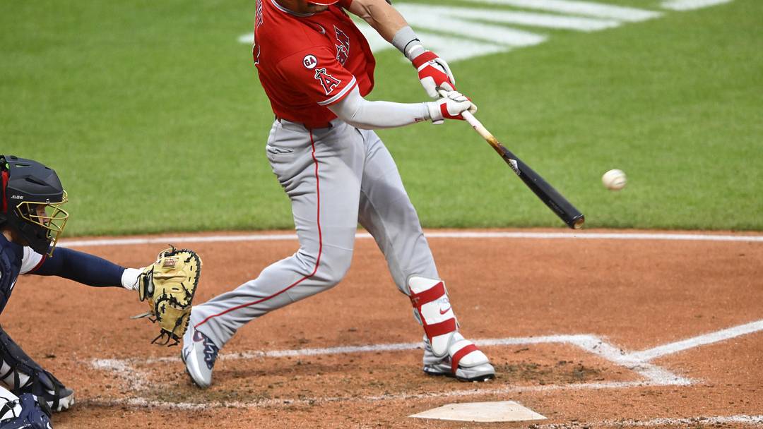 May 12, 2026; Cleveland, Ohio, USA; Los Angeles Angels center fielder Mike Trout (27) doubles in the fifth inning against the Cleveland Guardians at Progressive Field. Mandatory Credit: David Richard-Imagn Images
