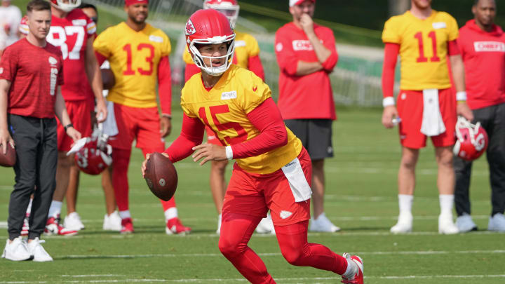 Jul 22, 2024; St. Joseph, MO, USA; Kansas City Chiefs quarterback Patrick Mahomes (15) drops back to pass during training camp at Missouri Western State University. Mandatory Credit: Denny Medley-USA TODAY Sports