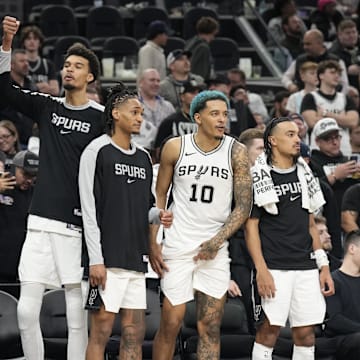 Jan 31, 2025; San Antonio, Texas, USA; San Antonio Spurs center Victor Wembanyama (1) and teammates react to a victory over the Milwaukee Bucks at Frost Bank Center.