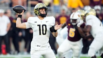 Nov 9, 2024; Tempe, Arizona, USA; UCF Knights quarterback Dylan Rizk (10) passes against the Arizona State Sun Devils during the first half at Mountain America Stadium, Home of the ASU Sun Devils. Mandatory Credit: Joe Camporeale-Imagn Images