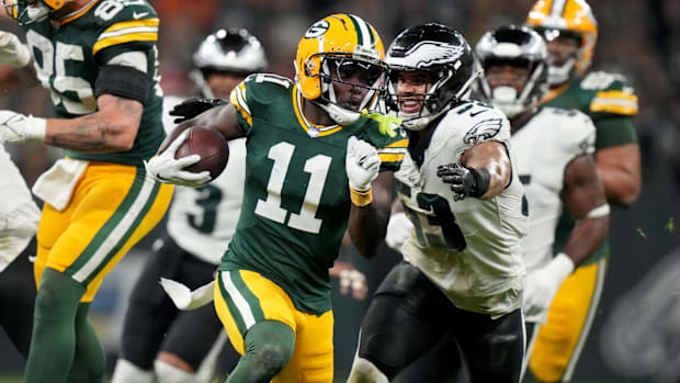 Green Bay Packers wide receiver Jayden Reed (11) runs against Philadelphia Eagles linebacker Zack Baun (53) in Week 1.