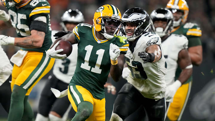 Sep 6, 2024; Sao Paulo, BRA; Green Bay Packers wide receiver Jayden Reed (11) runs against Philadelphia Eagles linebacker Zack Baun (53) during the first half at Neo Quimica Arena. Mandatory Credit: Kirby Lee-Imagn Images