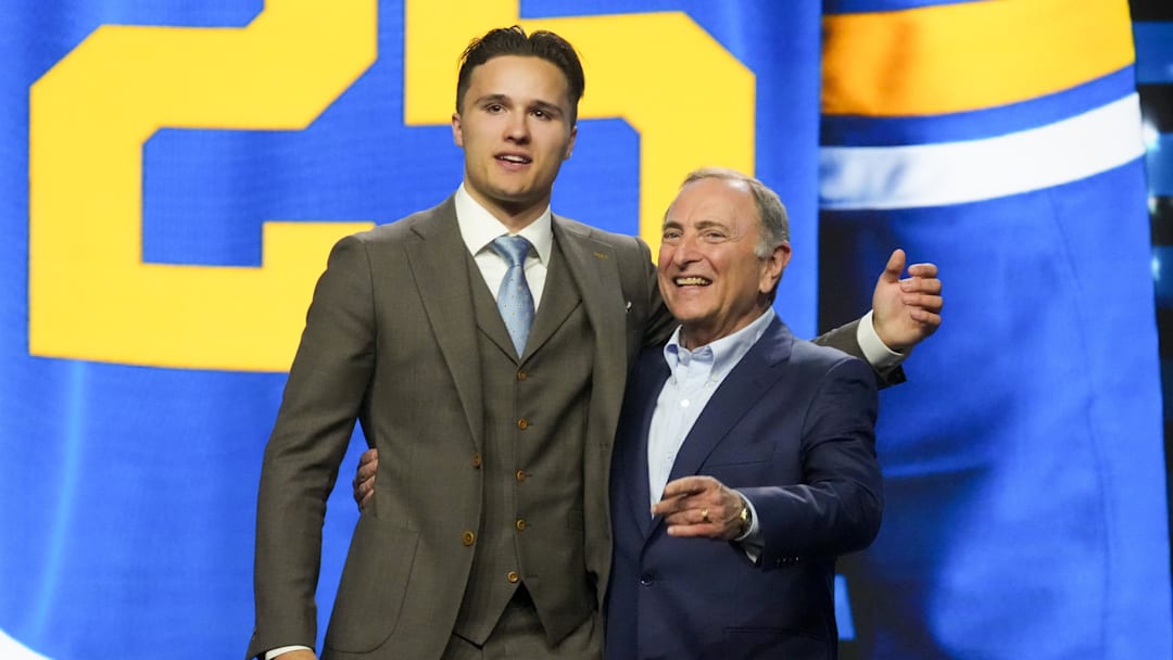 Jun 27, 2025; Los Angeles, California, USA; Justin Carbonneau is selected as the 19th overall pick to the St. Louis Blues in the first round of the 2025 NHL Draft at Peacock Theater. Mandatory Credit: Kirby Lee-Imagn Images