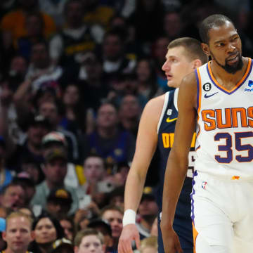 May 1, 2023; Denver, Colorado, USA; Phoenix Suns forward Kevin Durant (35) reacts after he was fouled by Denver Nuggets center Nikola Jokic (15 in the first half during game two of the 2023 NBA playoffs at Ball Arena. Mandatory Credit: Ron Chenoy-USA TODAY Sports