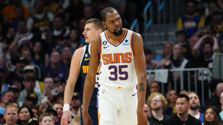 May 1, 2023; Denver, Colorado, USA; Phoenix Suns forward Kevin Durant (35) reacts after he was fouled by Denver Nuggets center Nikola Jokic (15 in the first half during game two of the 2023 NBA playoffs at Ball Arena. Mandatory Credit: Ron Chenoy-USA TODAY Sports