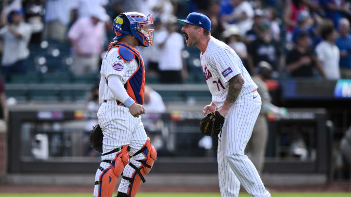 Jun 16, 2024; New York City, New York, USA; New York Mets pitcher Sean Reid-Foley (71) reacts with New York Mets catcher Luis Torrens (13) after the game final out against the San Diego Padres at Citi Field. Mandatory Credit: John Jones-USA TODAY Sports