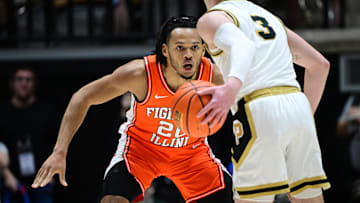 Jan 5, 2024; West Lafayette, Indiana, USA; Illinois Fighting Illini forward Ty Rodgers (20) defends