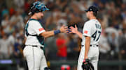 Sep 13, 2025; Seattle, Washington, USA; Seattle Mariners catcher Cal Raleigh (29) and relief pitcher Matt Brash (47) celebrate defeating the Los Angeles Angels at T-Mobile Park. Mandatory Credit: Steven Bisig-Imagn Images