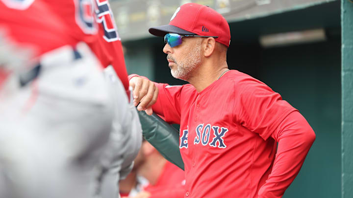 Boston Red Sox manager Alex Cora (13) looks on during the fifth inning against the Pittsburgh Pirates at LECOM Park.