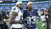 Dec 15, 2024; Charlotte, North Carolina, USA; Carolina Panthers wide receiver Xavier Legette (17) and Dallas Cowboys wide receiver Jalen Brooks (83) after a game at Bank of America Stadium. Mandatory Credit: Jim Dedmon-Imagn Images