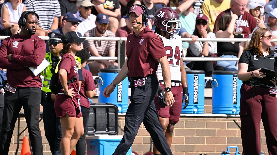 Fordham Rams head coach Joe Conlin walks the sideline during the first half against the Boston College Eagles Fordham Rams head coach Joe Conlin walks the sideline during the first half against the Boston College Eagles