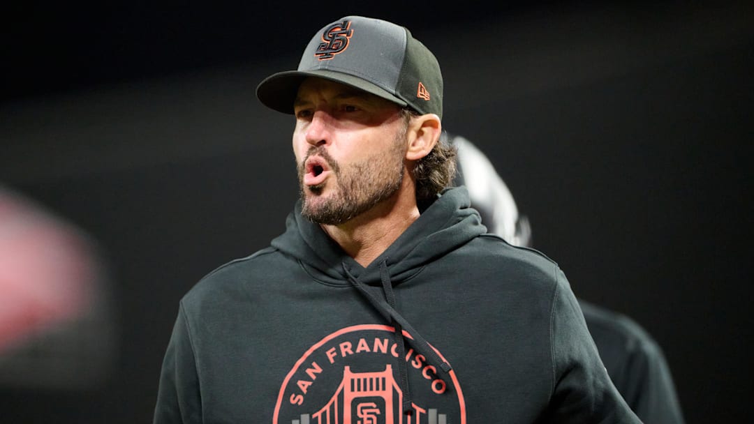 May 9, 2026; San Francisco, California, USA; San Francisco Giants manager Tony Vitello (23) reacts after infielder Christian Koss (50) was hit in the head with a pitch thrown by pitcher Cam Sanders (not pictured) during the ninth inning at Oracle Park. Mandatory Credit: Robert Edwards-Imagn Images