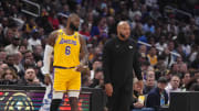 Apr 5, 2023; Los Angeles, California, USA; Los Angeles Lakers forward LeBron James (6) and coach Darvin Ham react against the LA Clippers in the first half at Crypto.com Arena. Mandatory Credit: Kirby Lee-USA TODAY Sports